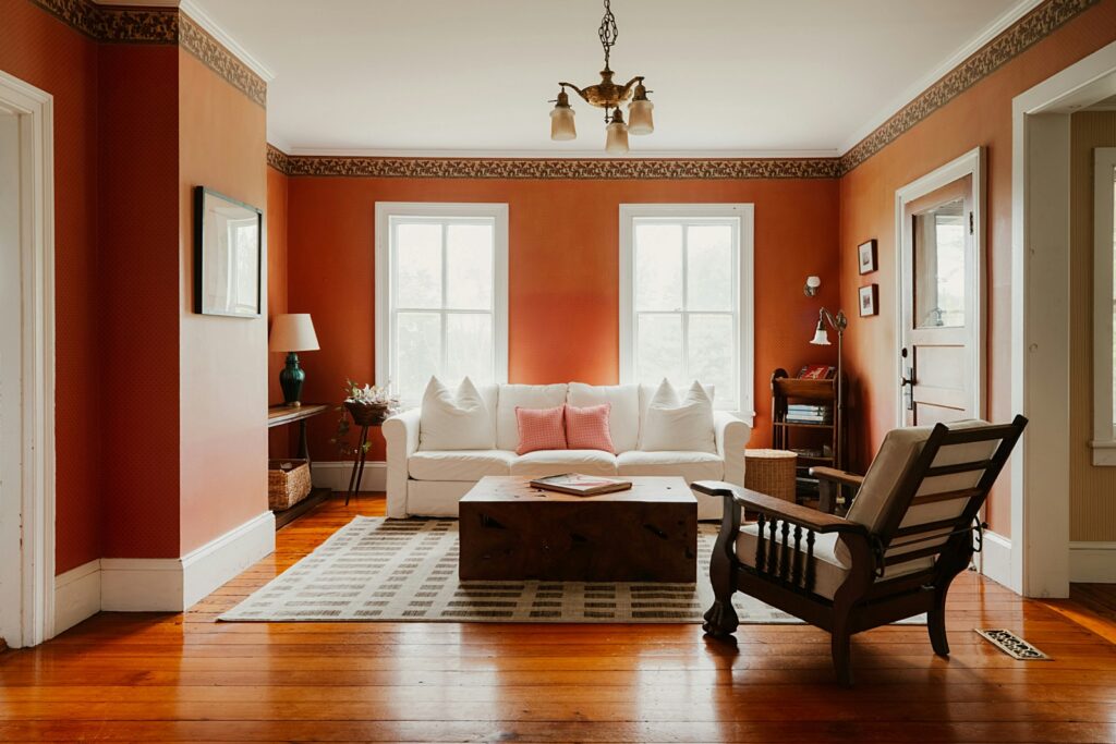 rust-colored walls in a fall inspired living room