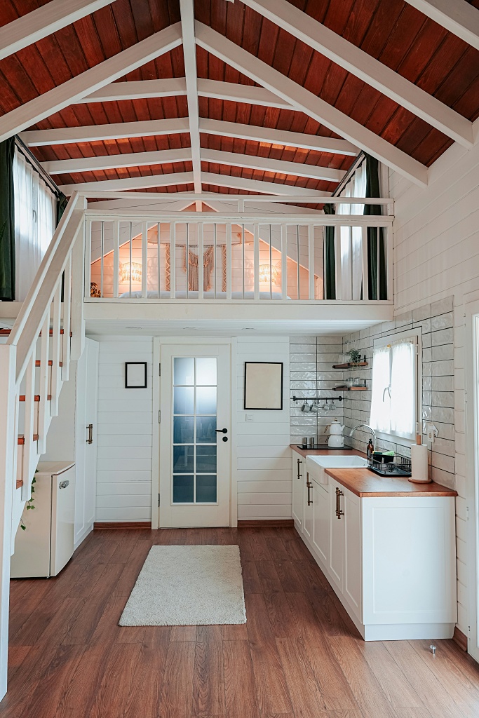 tiny dwelling with open staircase to sleeping loft