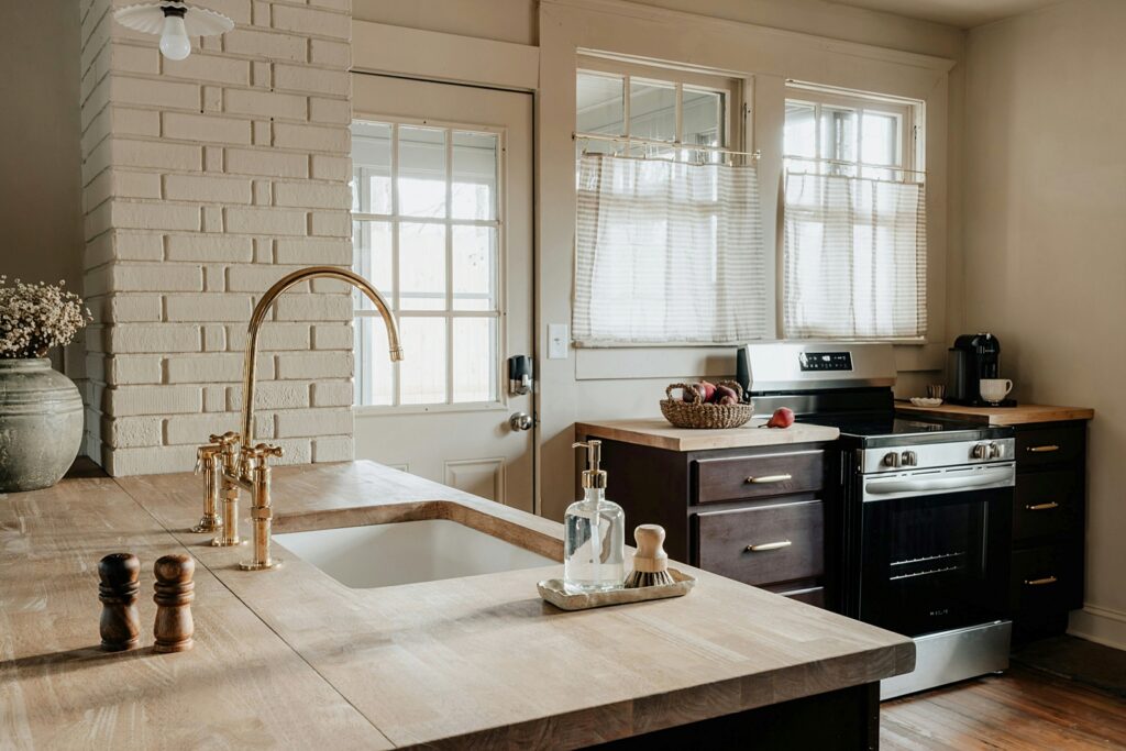 farmhouse kitchen with pretty window treatments