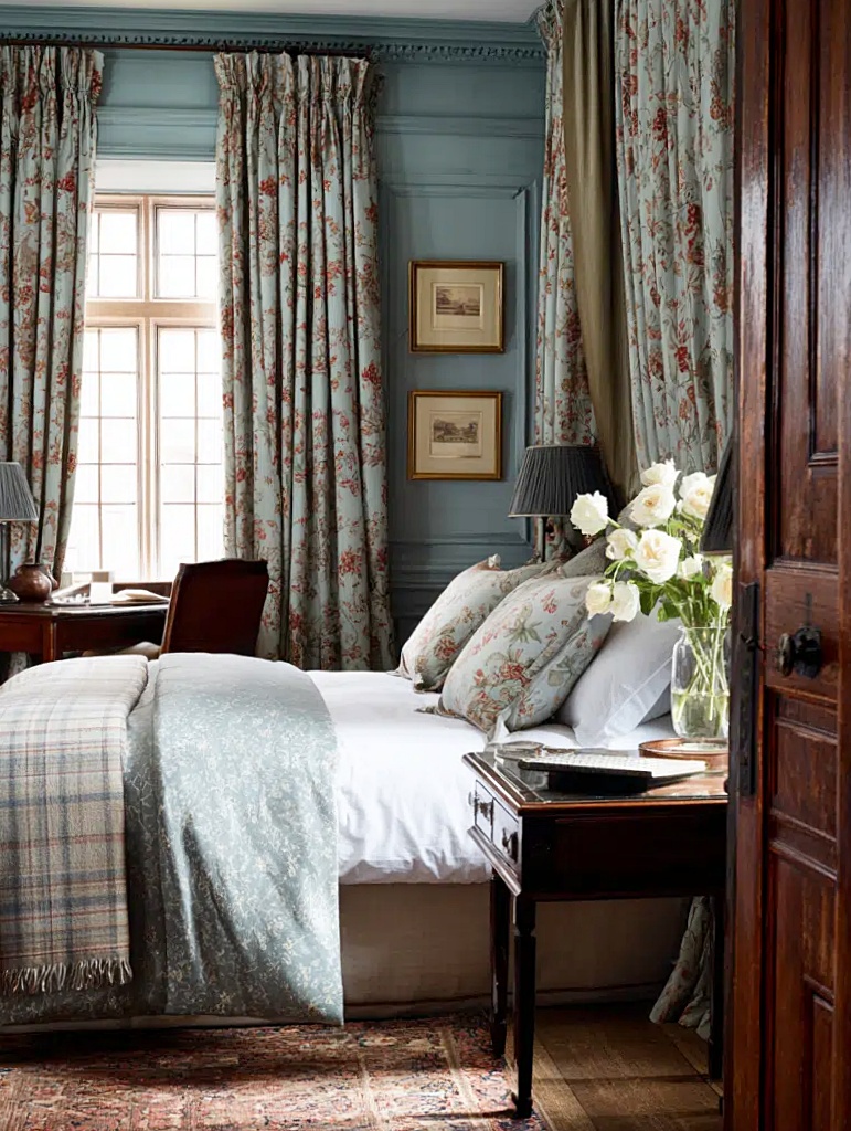 English country bedroom with pretty window treatments