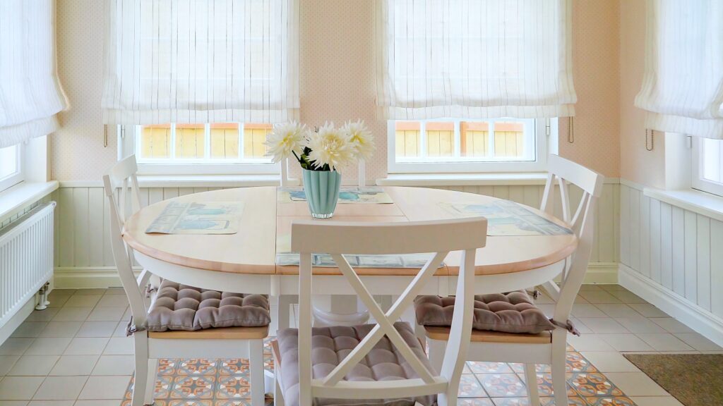 breakfast nook with Roman shades