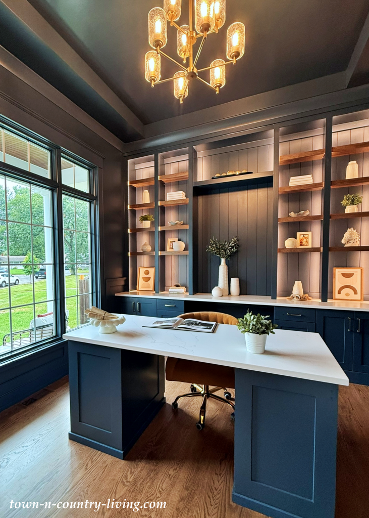 dark navy home office with large window