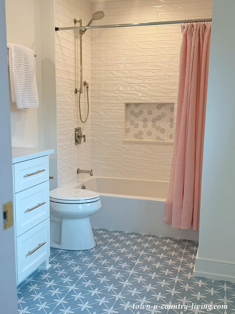 girl's bathroom with graphic floor pattern