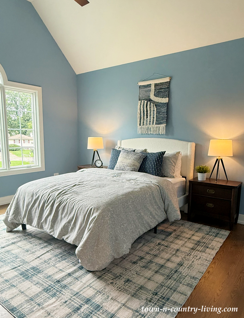 blue bedroom with vaulted ceiling