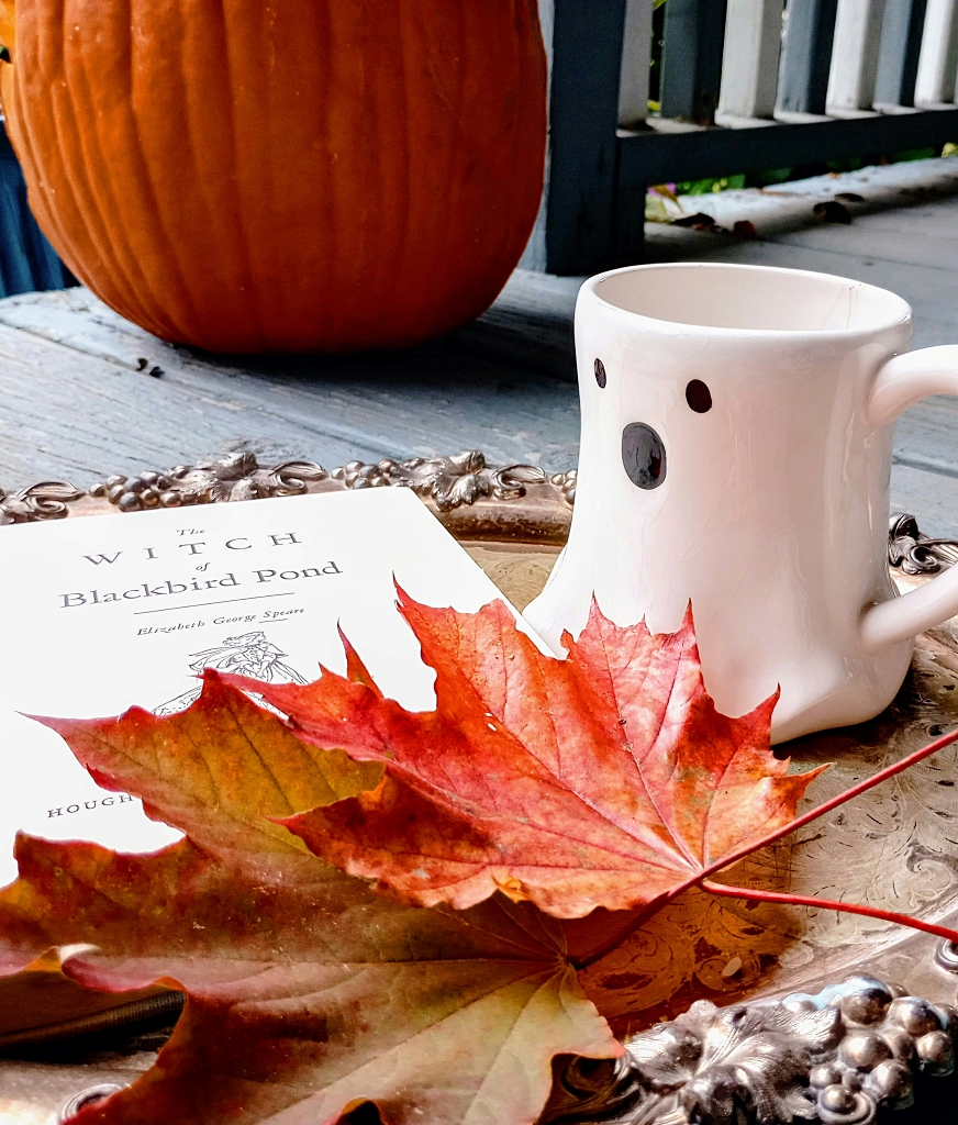 cute ghost mug with fall decorations
