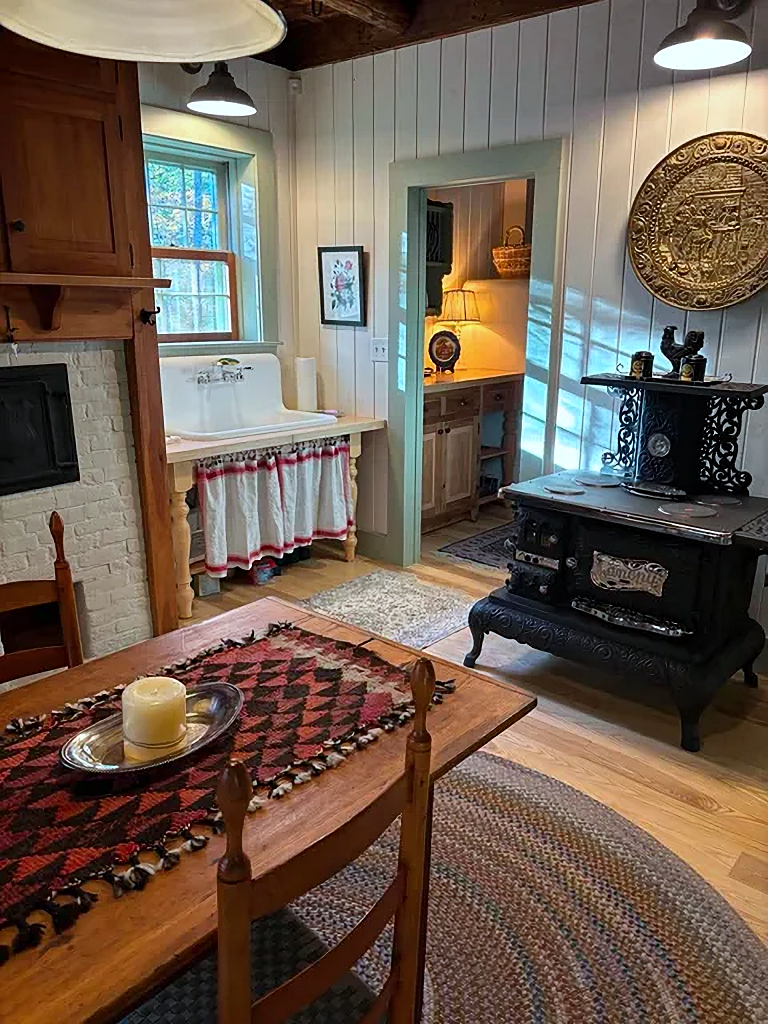 old stove and farmhouse sink in New England home