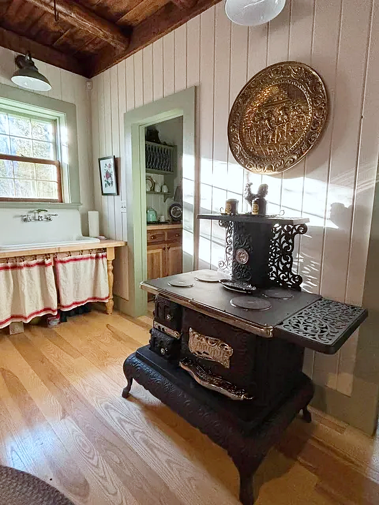 old stove and farmhouse sink in New England home